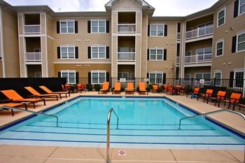 Private swimming pool with sun deck